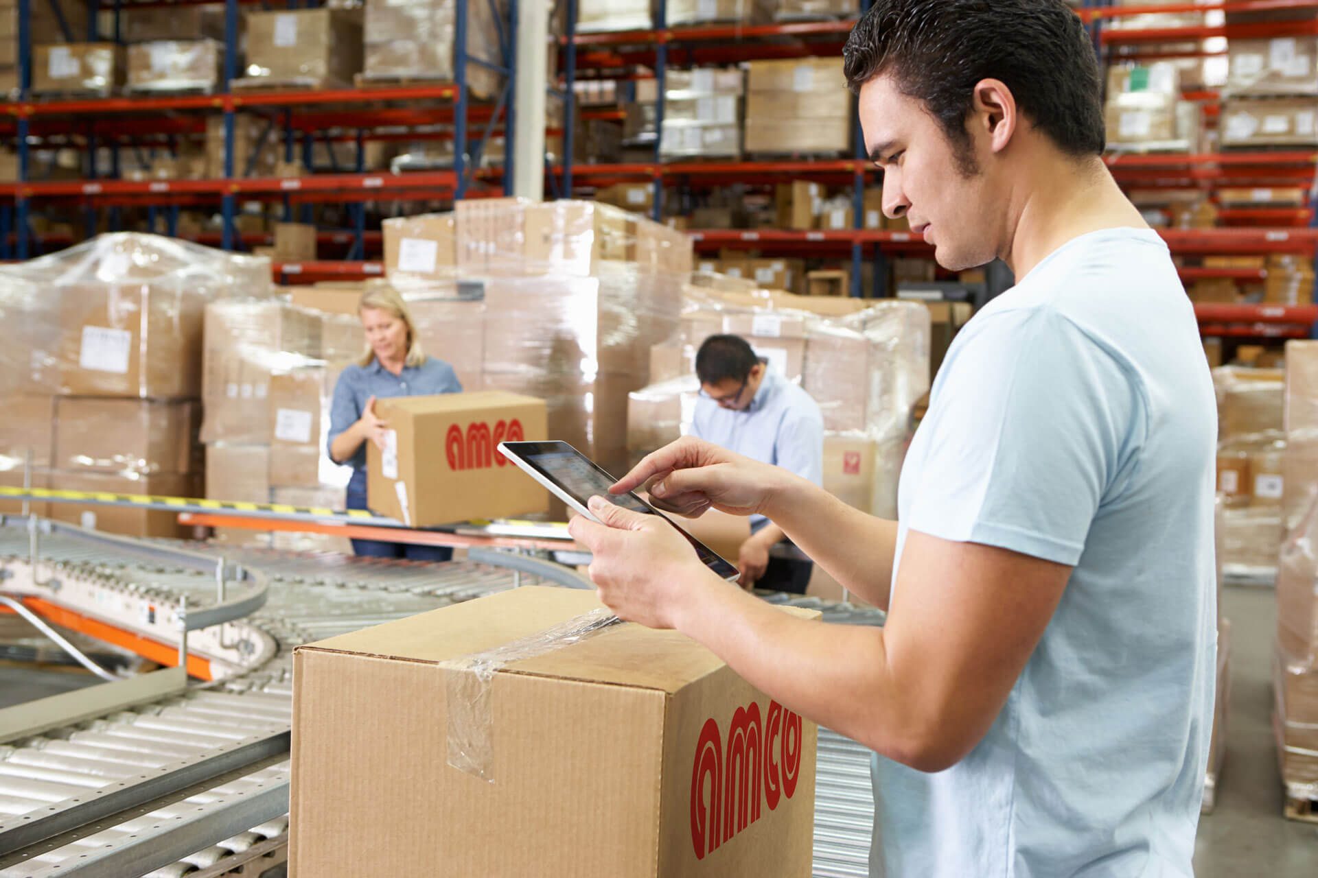 Man verifying package on the tablet