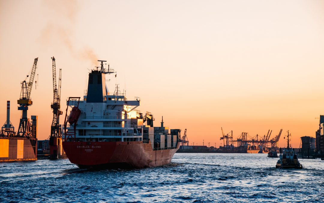 ship sailing in sunset