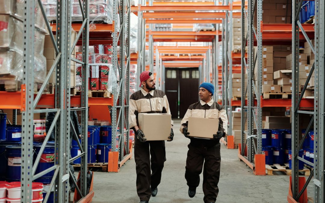 workers in a warehouse - amco group